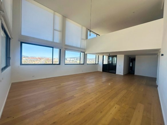 sala a doble altura de penthouse en venta en Juriquilla