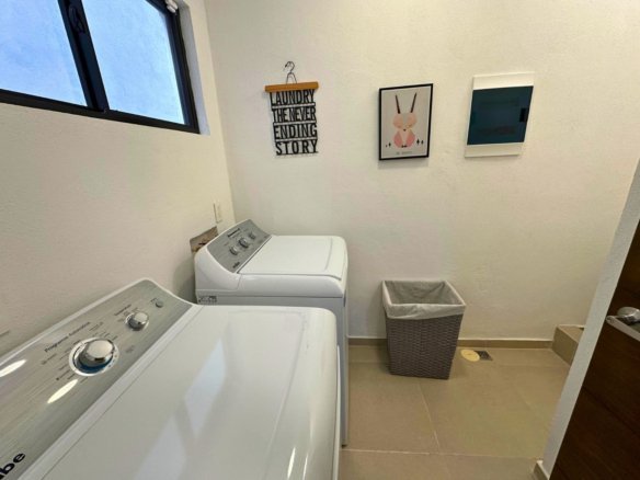 cuarto de lavado de casa en zibata con roofgarden