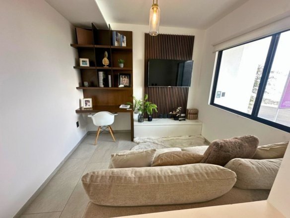 Sala de tv de casa nueva en Zibatá Querétaro en Entrecielos.