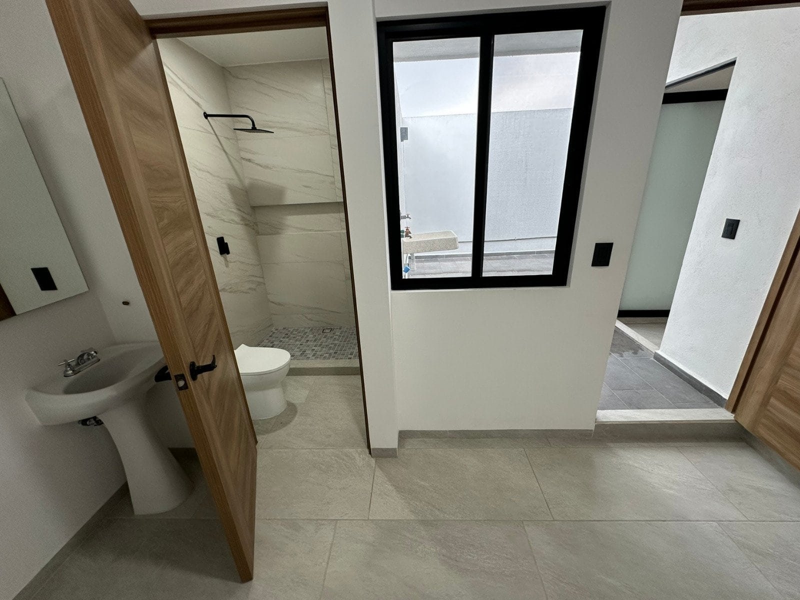 cuarto de servicio de casa con recámara en planta baja Zibatá Querétaro. En Entrecielos