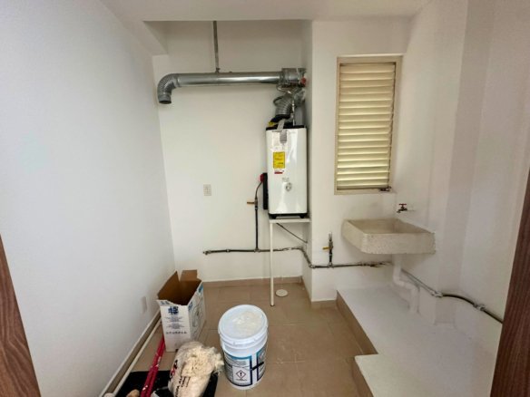 cuarto de lavado de departamento en Juriquilla, Querétaro.