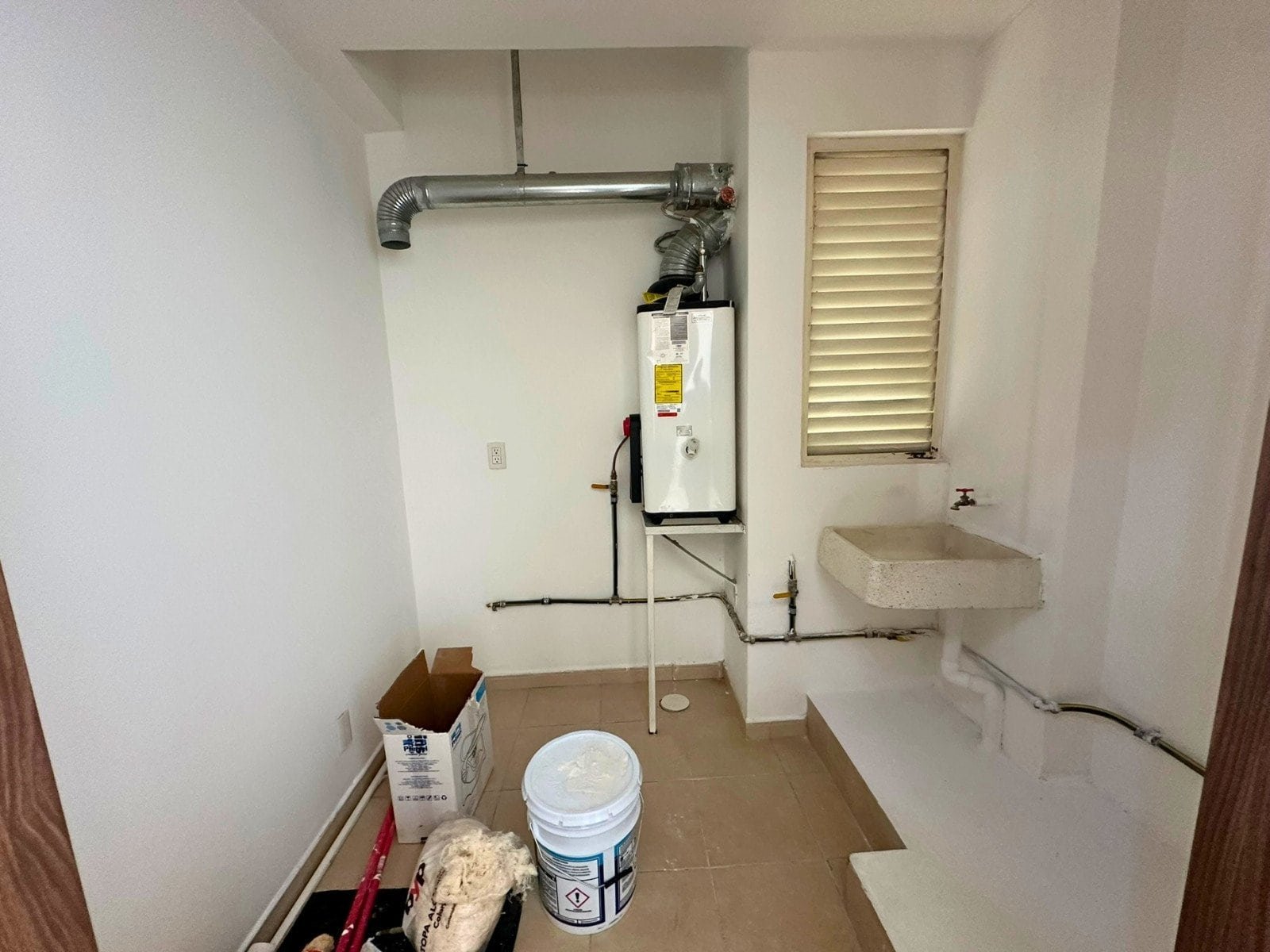 cuarto de lavado de departamento en Juriquilla, Querétaro.