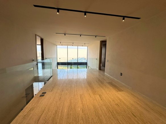 sala de tv de casa en campanario norte, Querétaro.