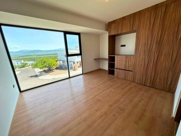 recamara 2 de casa en Zibata con sala a doble altura.