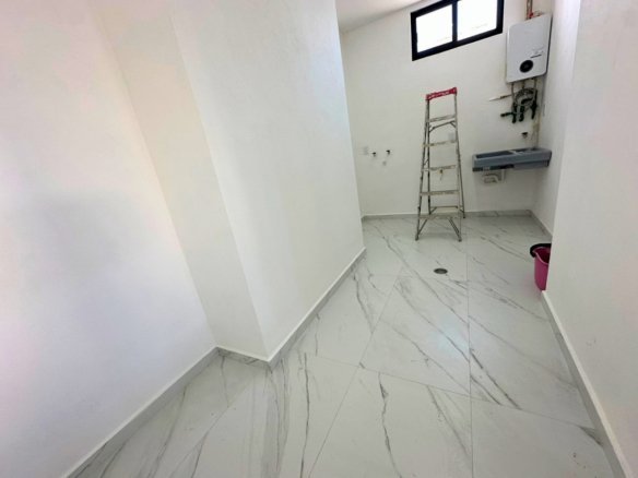 cuarto de lavado de hermosa casa en Zibata.