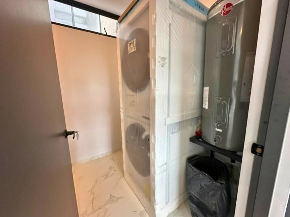 cuarto de lavado de casa en Residencial El Mayorazgo, Querétaro.