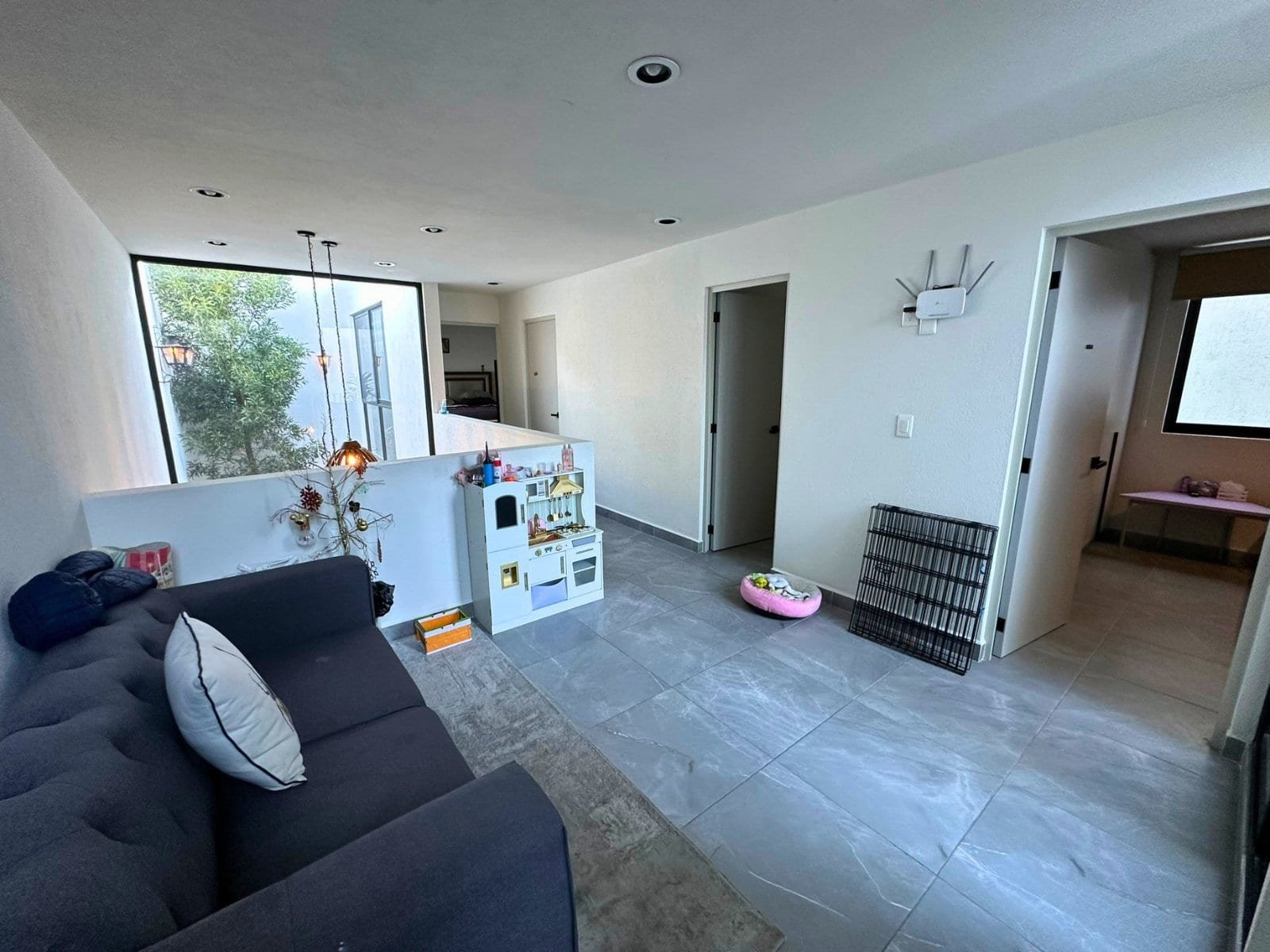 sala de tv de casa en venta en Sabino Zibatá, Querétaro.